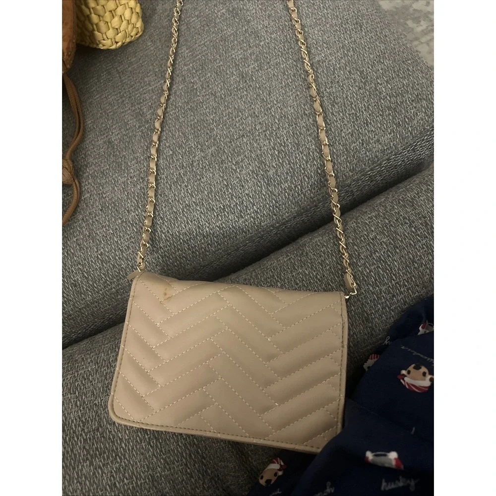 A Vintage bebe purse With Chain Strap